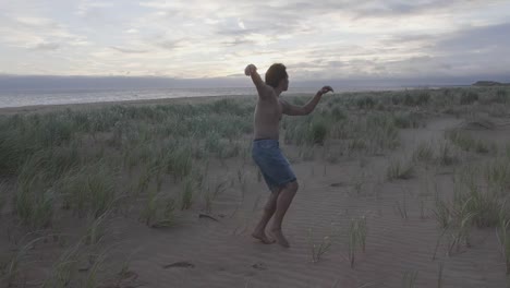 Dancing-on-the-beach-in-the-grass