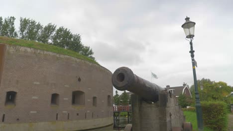 A-Close-up-Shot-of-an-Old-Cannon-in-a-World-Heritage-Area,-Amsterdam