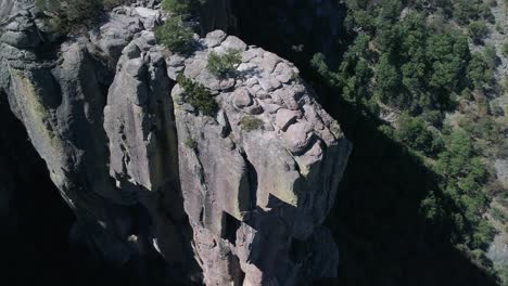 Aerial-tilt-down-shot-of-the-Piedra-Volada-in-Divisadero,-Copper-Canyon-Region,-Chihuahua