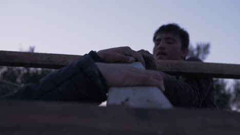 Afghan-refugees-construct-makeshift-shelter-at-dusk