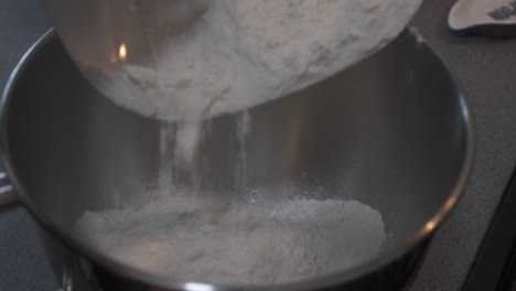 Pouring-Flour-into-a-bowl