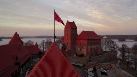 AERIAL:-Flag-of-Vytis-on-the-Tower-of-Trakai-Castle