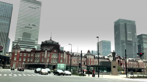 Car-around-the-old-building-of-tokyo-station,-Marunouchi-north-and-south-entrance-exit