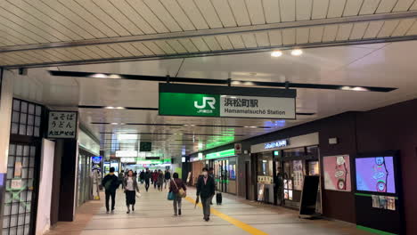 People-walking-through-passageway-inside-North-gate-of-Hamamatsucho-Station