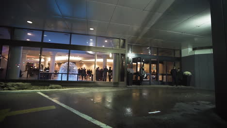 Approaching-a-large-wedding-banquet-hall-at-night