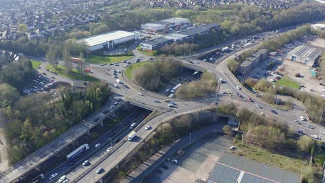 Aerial-footage-of-a-large-section-of-commuter-motorway,-highway,-during-busy-congestion,-traffic,-rush-hour