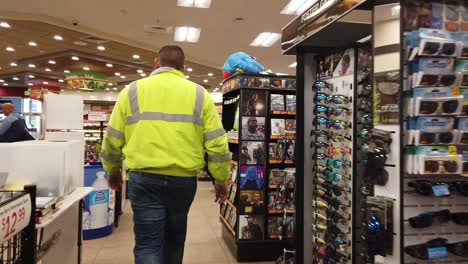 Man-walking-in-truck-stop-in-slow-motion