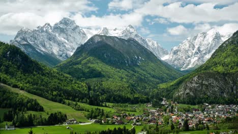 Time-Lapse-of-the-clouds-moving-over-the-Julian-Alps-looking-over-Mojstrana-an-Alpine-village