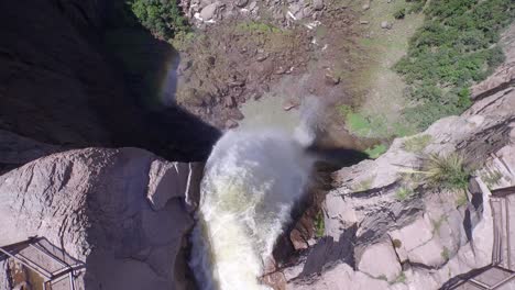 Aerial-tilt-down-drone-shot-on-the-top-of-Basaseachi-waterfall-in-the-Candamena-Canyon,-Chihuahua