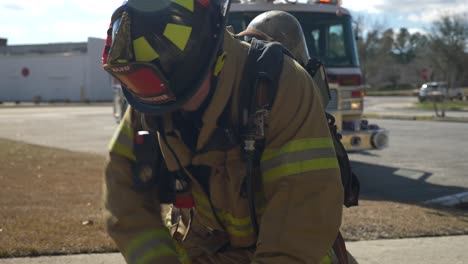 Firefighter-starts-up-a-hacksaw-to-use-for-rescuing-while-responding-to-an-emergency