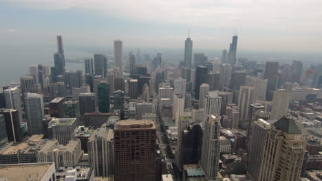 Luftaufnahme,-Wolkenkratzer,-Panorama-Der-Hohen-Gebäude,-Innenstadt,-Stadt-Chicago,-Vereinigte-Staaten,-USA,-Stadtbild,-Blick-Auf-Die-Spitze-Des-Hancock-Turms,-Himmel,-Fluss,-The-Loop-Area