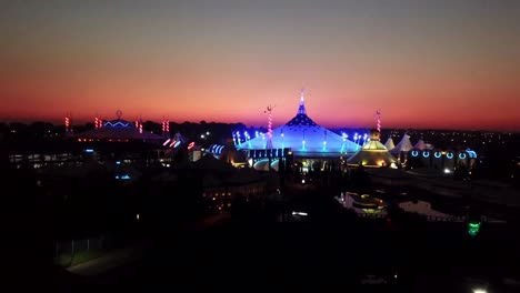 A-beautiful-twilight-elevated-panning-view-of-Carnival-City,-Boksburg,-Benoni,-Johannesburg,-South-Africa