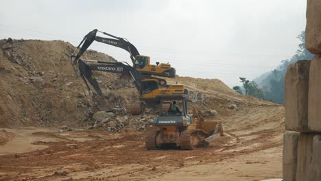 Heavy-machinery-doing-the-earthwork-site-clearing-at-the-construction-site
