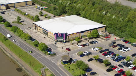 Aerial-sweeping-shot-of-Hollywood-Bowl,-located-on-Medway-Valley-Leisure-Park,-Strood,-Kent,-UK