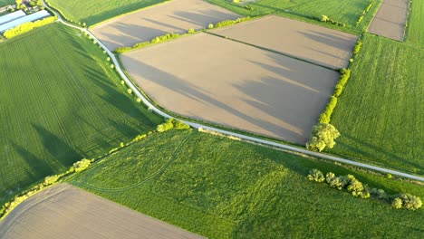 Aerial-of-fields-at-sunset