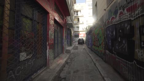 Urban-dark-alley-full-of-graffiti-in-Psiri-neighborhood-in-Athens-Greece-2