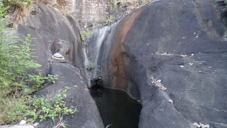 Shanka-Theertha-Pond-at-Narahari-Parvatha-Temple,-DK-KA-India-Although-the-temple-is-at-1000ft-high-above-the-ground,-the-water-here-never-goes-down-in-these-ponds