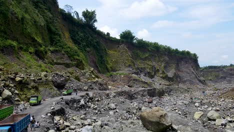 Aerial-view-of-active-open-sand-pit-Merapi-mine-in-Magelang,-Indonesia