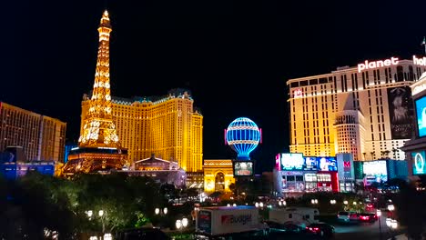 Night-shot-of-Eiffel-Tower-and-blue-balloon-in-Las-Vegas,-Nevada,-USA