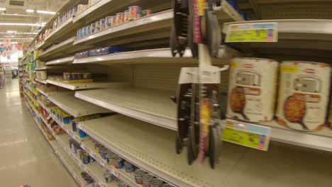 Nearly-empty-shelves-for-canned-goods-at-HEB-grocery-store