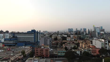 4k-aerial-video-rising-up-from-the-Parque-Mercedes-Cabello-looking-at-the-Hospital-Central-FAP-and-the-RPP-Noticias-building