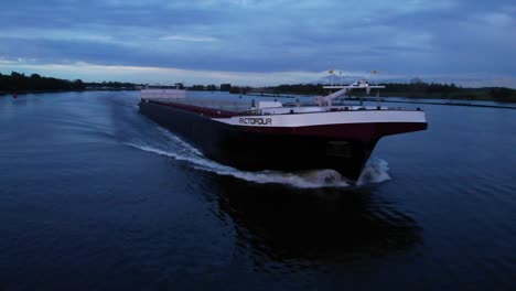 Container-Ship-Of-Factofour-Sails-Down-In-Barendrecht-Town-In-Netherlands