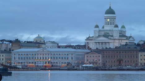 Time-lapse-showing-the-cityscape-of-Helsinki,-evening-daylight