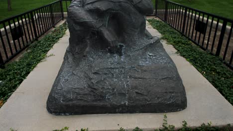 Prescott-cowboy-statue-with-a-wide-brim-hat-in-bronze