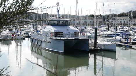 Fisheries-patrol-boat-moored-at-Conwy-marina-Luxury-yachts-boating-waterfront-North-Wales-dolly-right