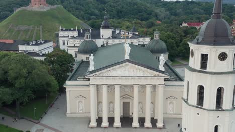 AERIAL:-Palace-of-the-Grand-Dukes-of-Lithuania-and-Vilnius-Cathedral-with-Bell-Tower-in-Summer-Evening