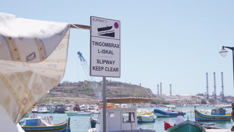 View-of-a-signboard-indicating-to-keep-the-place-clear-for-slipway