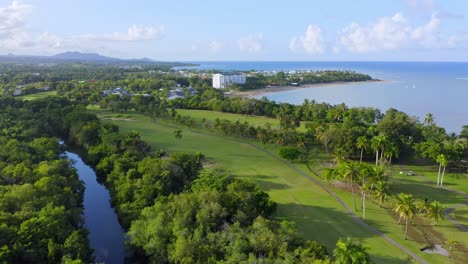 Green-And-Scenic-Landscape-Of-Desembocadura-in-Rio-Munoz,-Puerto-Plata-Dominican-Republic---aerial-shot