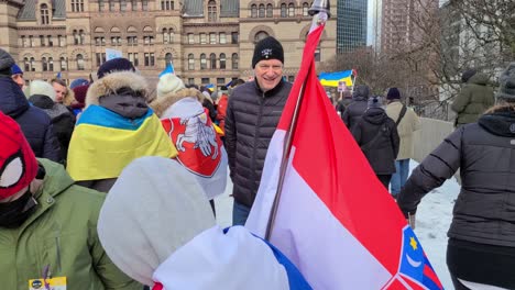 Crowded-square-during-a-protest-against-Russia’s-invasion-of-Ukraine,-Downtown-Toronto