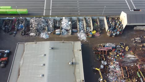 Stena-scrap-yard-in-Stavanger-Norway---Aerial-looking-down-on-compartments-with-scrap-carefully-segregated-and-divided-into-categories---Slowly-moving-from-left-to-right