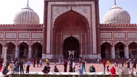 ancient-mosque-with-people-and-bright-sky-at-morning-from-unique-perspective-video-is-taken-at-jama-masjid-delhi-india-on-Mar-30-2022