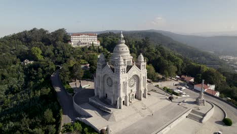 Aerial-view-around-the-Santuário-de-Santa-Luzia,-in-sunny-Viana-Do-Castelo,-Portugal---orbit,-drone-shot