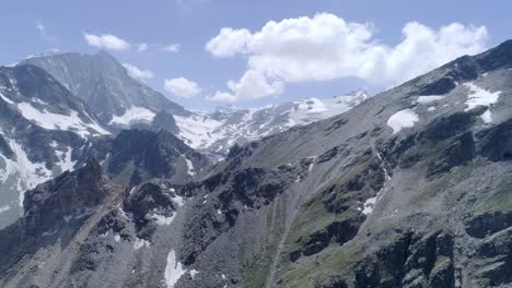 Aerial-shot-over-barren-mountain-summits-Arolla-valley,-Valais---Switzerland