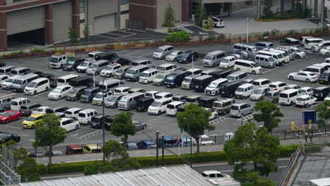 Yokohama-Japan---Circa-Time-lapse-of-car-parking-area,-locked-shot-outdoor-daytime