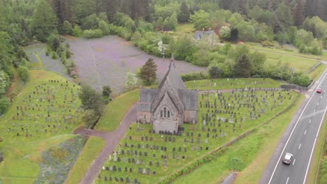 Cars-driving-by-St-John's-Episcopal-Church,-Scotland