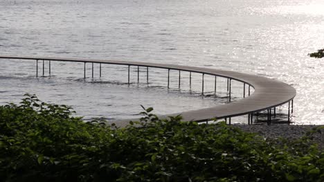 Infinite-bridge-in-Aarhus,-Denmark-an-early-morning-at-sunrise-seen-from-the-small-viewingpoint