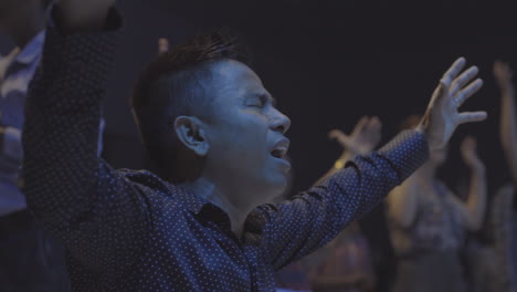 Cambodian-man-worshipping-in-Christian-church