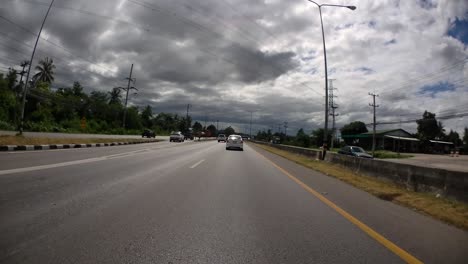 This-is-a-time-lapse-with-an-action-camera-mounted-in-front-of-the-truck,-driving-from-Pranburi-to-Hua-Hin-and-Hua-Hin-to-Bangkok-on-Phet-Kasem-Road