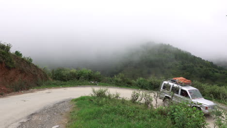 Kathmandu,-Nepal---September-27,-2019:-Traffic-and-vehicles-on-a-dangerous,-muddy-mountain-road-in-the-foothills-of-Kathmandu,-Nepal-on-September-27,-2019