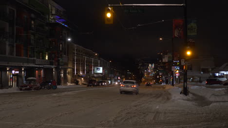 A-Cold-Winter-Night-With-Few-People-Walking-Outdoors-And-No-Traffic-On-The-Road-In-Hastings-County,-Ontario-Canada---Steady-Shot