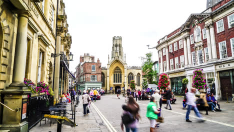 York,-Yorkshire,-United-Kingdom,-circa-:-Tourists-visiting-and-shopping-in-Stonegate-street-in-York,-UK