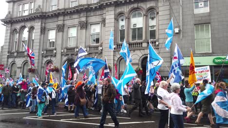 People-marching-on-the-main-road-for-Scottish-Independence-in-the-city-of-Aberdeen