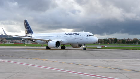 A-Lufthansa-Airbus-airplane-heading-towards-the-runway-for-take-off,-Napoli,-Italy