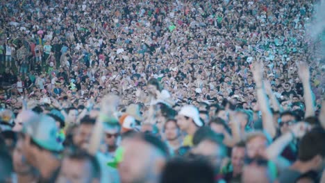 Artistic-half-blurred-festival-crowd-partying-and-dancing
