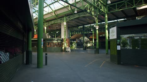 Lockdown-in-London,-empty-Borough-Market-with-shut-retail-shops,-closed-and-shuttered,-during-the-Coronavirus-pandemic-2020