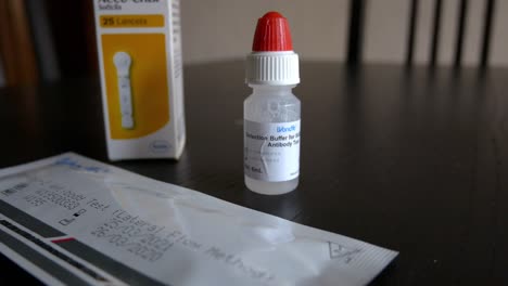 Ungeöffnetes-Wondfo-Rapid-Antigen-Covid-Test-Kit,-Päckchen-Lanzetten-Und-Pufferlösung